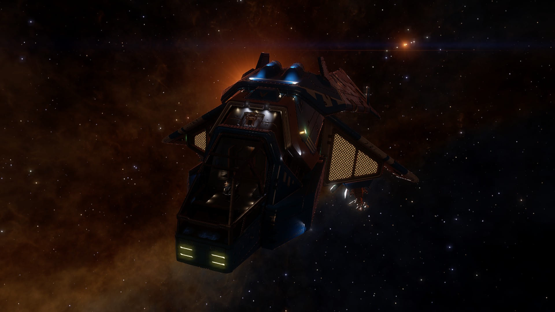 My small explorer ship from the outside, with orange glim from the surrounding galaxies
