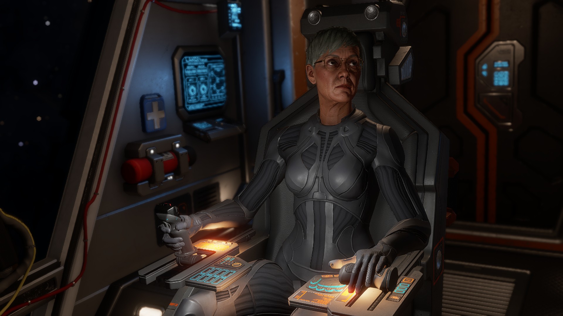 Commander Rhodse sitting in the cockpit seat - she has short grey hair and is wearing glasses with a thin metal frame, her face is kind of wrinkly and she's looking to her upper left as if watching the stars above
